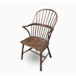 A 19th century West Country ash and elm hoopback windsor armchair, early 19th century, with a