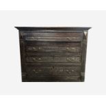 A Georgian carved oak chest of drawers, with four long drawers, height 86cm, width 101.5cm, depth