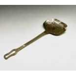 A Victorian brass cream scoop, 46 x 18cm.