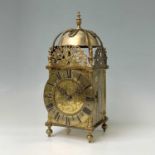 A 17th century style brass lantern clock case, 20th century, height 38cm, diameter of dial 16.5cm,