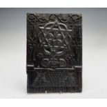 A carved oak panel dated 1898, 38 x 26.5cm.