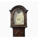 An early Victorian pine cased eight day longcase clock, the arched dial painted with old father
