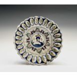 An English delft polychrome decorated lobed dish, probably Bristol, circa 1710, with royal