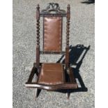 A Victorian carved oak folding chair, height 85cm, width 44cm.