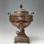 A Regency copper tea urn, height 37cm, width 25cm, depth 23cm. Provenance:Michael Trethewey. A