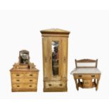 An Edwardian pine three piece bedroom suite, comprising a wardobe, dressing table and marble