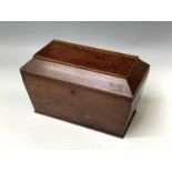 A Regency pheasantwood veneered tea caddy, the central glass mixxing bowl flanked by hingeed