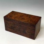 A George III burr yew tea caddy, with two hinged compartments flanking a glass mixing bowl, height