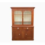 A Victorian Cornish pine dresser/kitchen cabinet, with a pair of glazed doors enclosing three