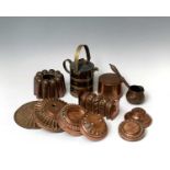 A Victorian copper jelly mould, height 10.5cm, diameter 15.5cm and other copper moulds etc.