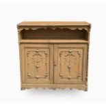 A pine side cabinet, with Liberty paper label attached inside a door, height 99cm, width 96.5cm,