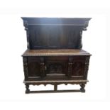 A carved oak sideboard, 19th century, height 168cm, width 147cm, depth 59cm.