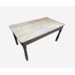 A Victorian pine kitchen table, the rectangular top with rounded corners above two drawers, on