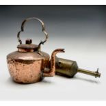 A John Linwood brass clockwork spit, late 19th century, length 33.5cm and a Victorian copper kettle,