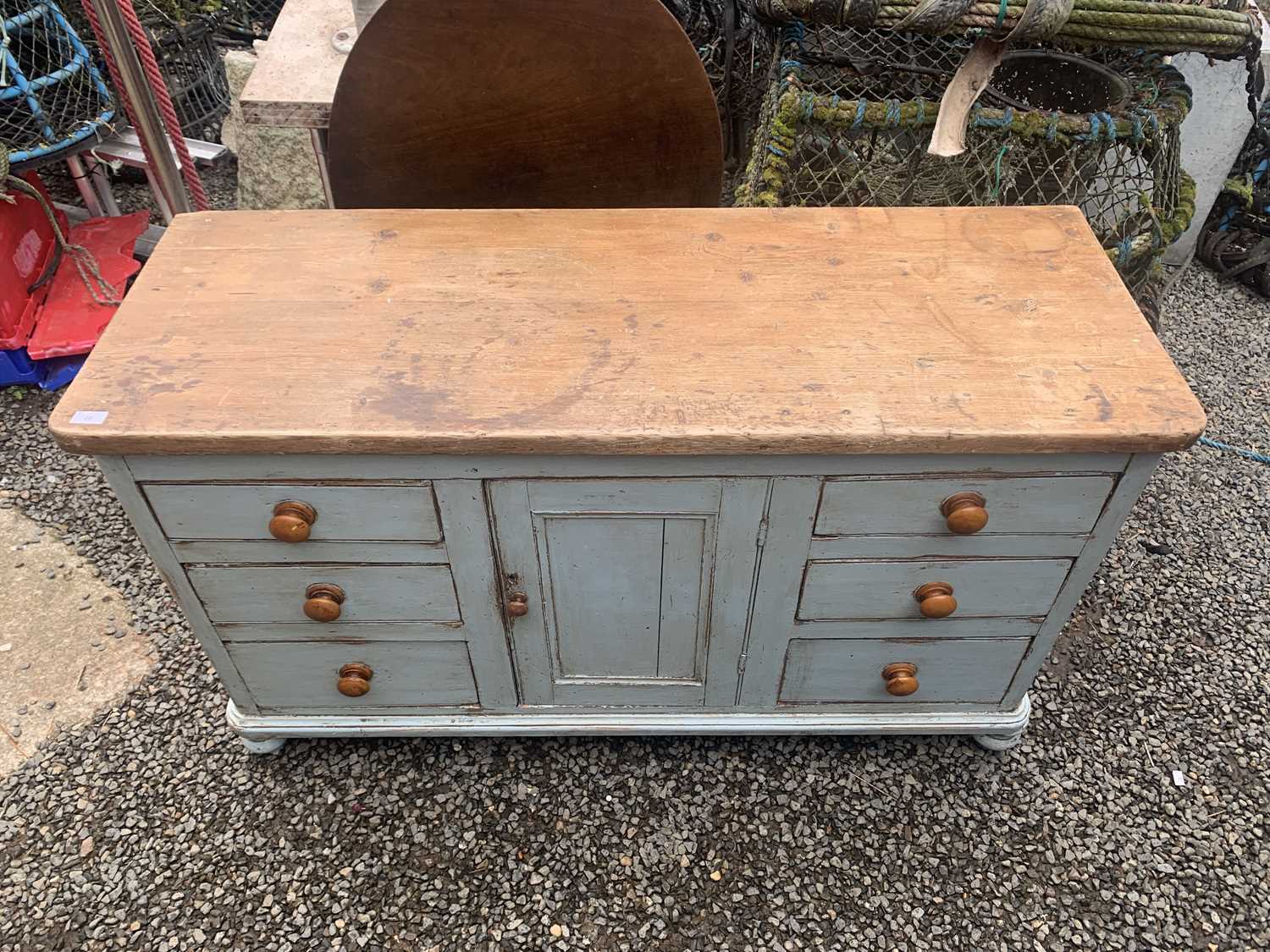 A Victorian painted pine low dresser, with a central panelled door flanked by six drawers, height - Image 3 of 15