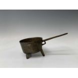 A bronze skillet, 18th century, height 14.5cm, diameter 18cm, length 38cm. Provenance:Michael