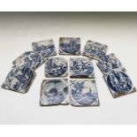 A set of eleven Dutch Delft blue and white tiles, 18th century, some biblical scenes, 13 x 13cm.