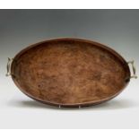 A burr ash twin handled oval tray, early 20th century, 53cm x 31.5cm.Condition report: The tray is