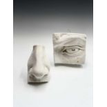 Two plaster moulds, one of an eye the other a noseFrom the estate of Alec Wiles