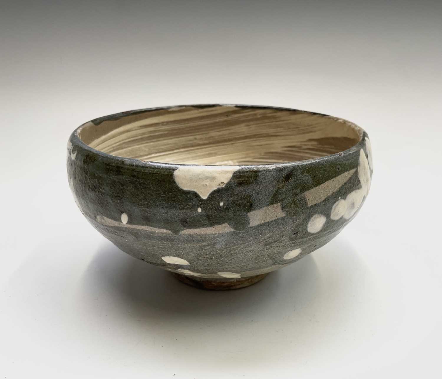 William MARSHALL (1923-2007) A stoneware footed bowl, the swollen body with brushed blue and grey