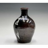 Trevor CORSER (1938-2015) A tenmoku glazed saki bottle Impressed personal and Leach Pottery, St Ives