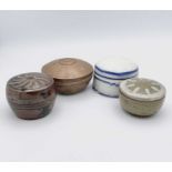 Four studio pottery cosmetic boxesCondition report: The pot with white slip has the tiniest chip/