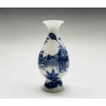 A Chinese blue and white porcelain baluster vase, 18th century, with figures in a fenced garden,