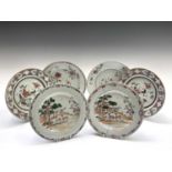 A pair of Chinese famille rose porcelain plates, 18th century, each decorated with deer beneath a