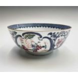 A Chinese porcelain famille rose bowl, Qianlong, decorated with blue cartouches enclosing figures