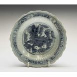 A Chinese blue and white dish, Ming Dynasty, depicting a Qilin to the centre and character marks