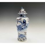 A Chinese porcelain baluster vase and cover, late 19th century, surmounted by a dog of fo, with