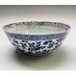 A Chinese porcelain blue and white bowl, 18th century, the interior with a stylised dragon and