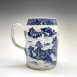 A Chinese Export porcelain blue and white mug, Qianlong Period, with pagodas and trees before a