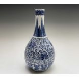 A Chinese Ming style porcelain blue and white bottle vase, late 19th century, with four character