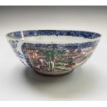 A Chinese Export famille verte bowl, 18th century, the panels decorated with hunting scenes and