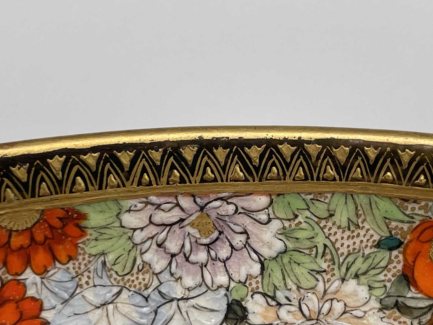 A Japanese Satsuma plate by Ryuzan, Meiji Period, gilt decorated with geisha in a garden setting, - Image 15 of 16