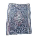 A Senneh kelim, West Persia, circa 1900, with the all over herati pattern, the indigo field with a