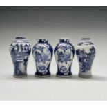 Two similar Chinese porcelain prunus blossom baluster vases, late 19th century, each with four