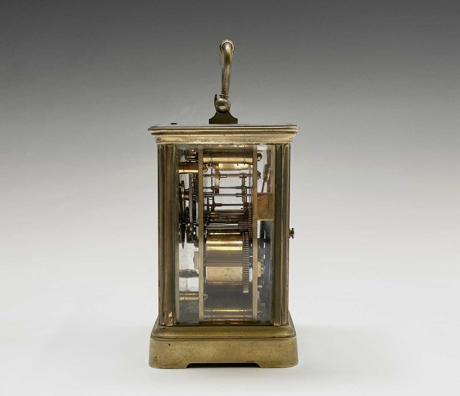 A French brass repeating carriage clock, circa 1900, with white enamel dial, striking on a coiled - Image 6 of 7