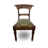 A William IV mahogany bar back dining chair on turned and fluted front legs.