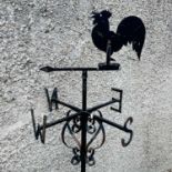 A black painted weathervane, 20th century, mounted with a cockerel, height 133cm.