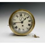 A brass cased ship's bulkhead wall clock, early 20th century, the painted dial with subsidiary