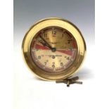 A U.S. Maritme Commision ship's radio room clock, by The Chelsea Clock Co, Boston, the brass dial
