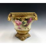 A Royal Worcester blush ivory floral decorated and gilt jardiniere, circa 1900, with goat mask