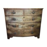 A Victorian mahogany bow front chest, of three long and two short drawers, on bracket feet. Height