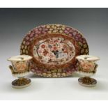 A pair of Derby campana form inkwells, circa 1820, decorated in an Imari palette, height 9cm,