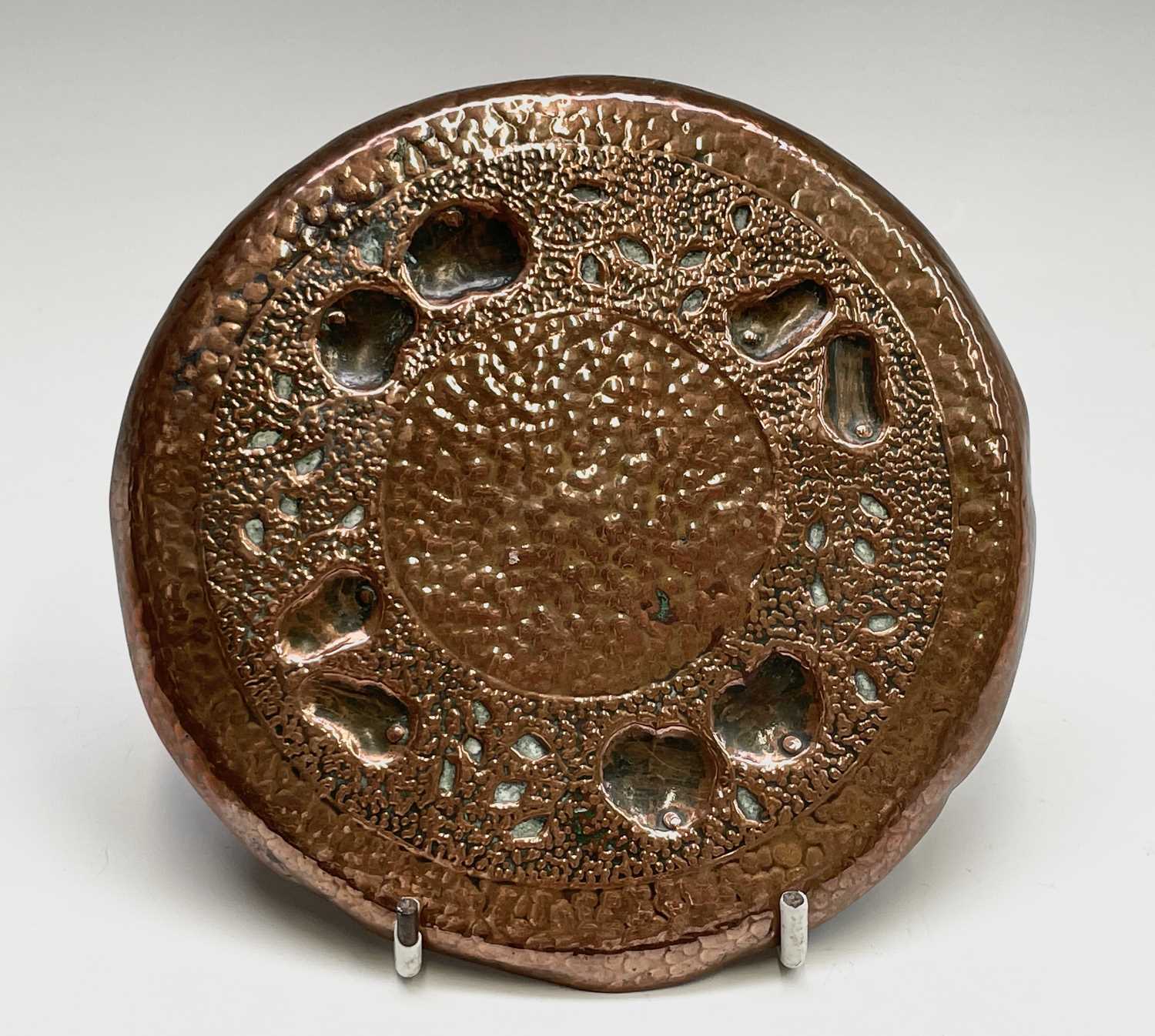 A Newlyn copper small circular dish, repousse decorated with apples and pears on a planished ground, - Image 5 of 6
