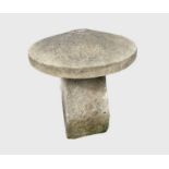 A staddle stone, consisting of a limestone base and a reconstituted stone top. Height 66cm.