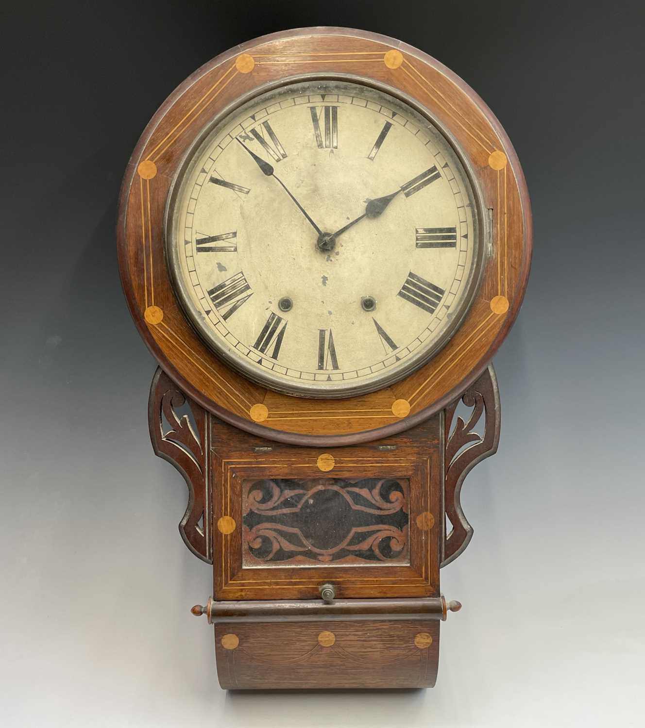 A Victorian walnut and inlaid drop-dial eight-day wallclock, with white painted dial, height 70cm.