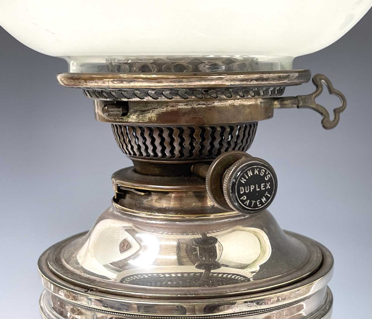 An Edwardian silver plated urn shaped table oil lamp, with Hink's patent burner and with an etched - Image 5 of 10